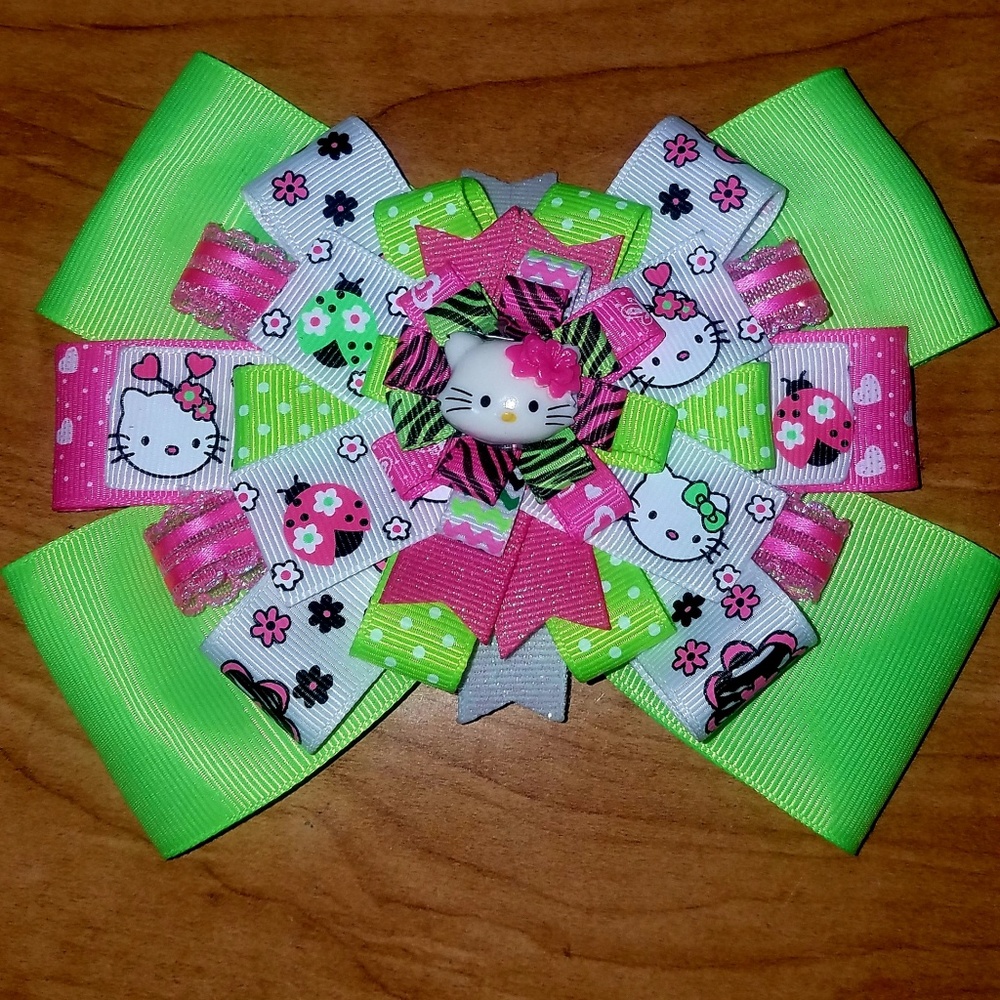 Hot pink and green Hello Kitty hair bow.